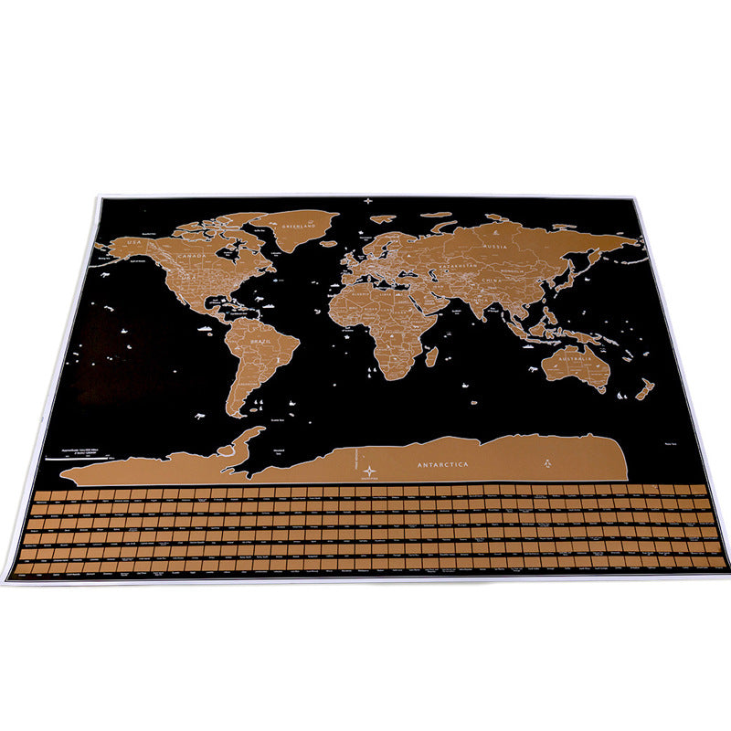 Scratch-off world map poster laid flat
