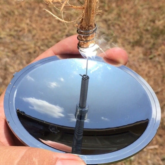 Compact solar lighter closed on a natural wooden surface