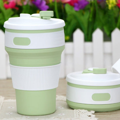 Green collapsible silicone travel cup expanded and collapsed