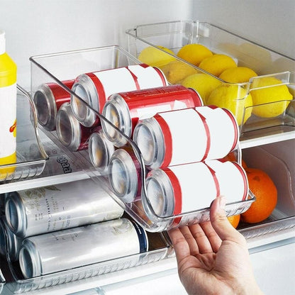 Transparent fridge can organizer dispenser next to lemons