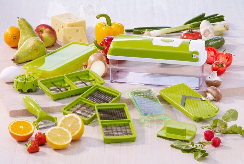 Vegetable chopper with interchangeable grater and dicer blades