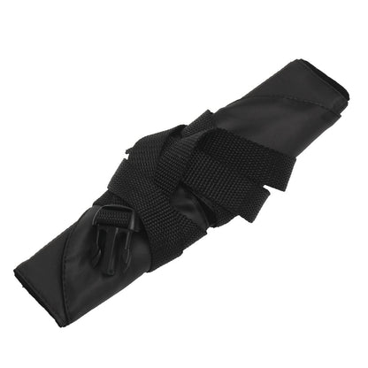 Foot hammock rolled up and secured with its strap