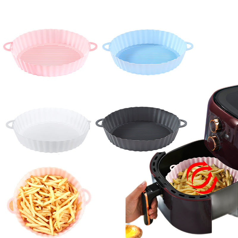 Assorted colors of reusable silicone air fryer pots with french fries