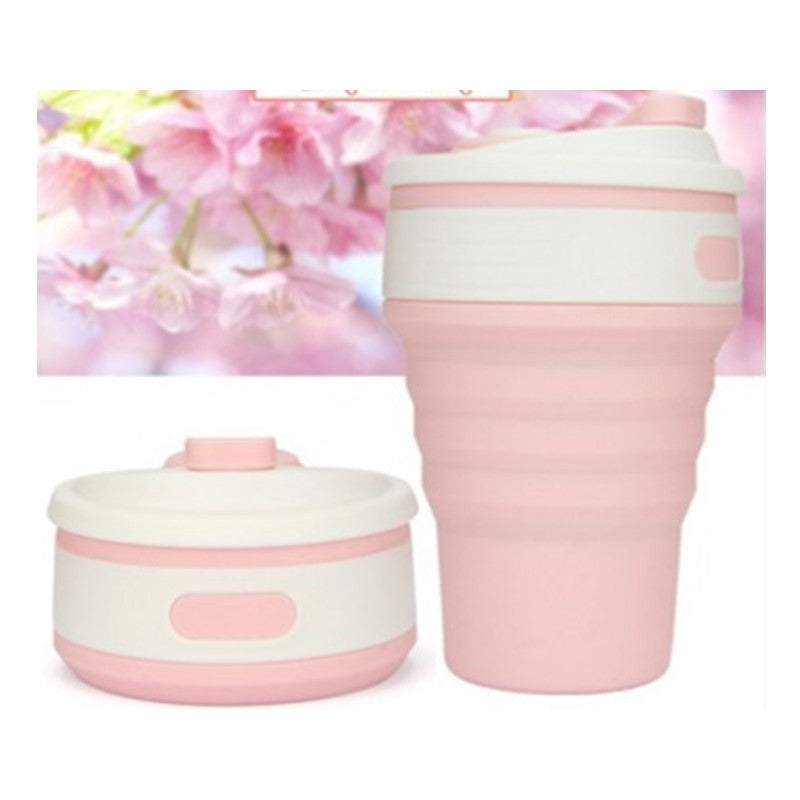 Pink collapsible silicone travel cup expanded and collapsed