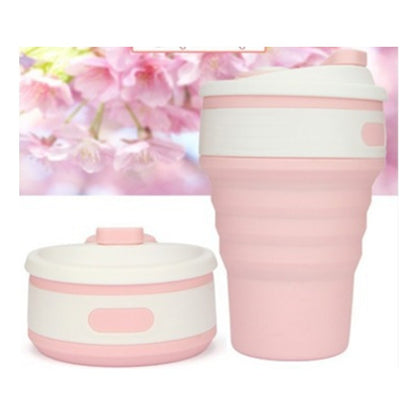 Pink collapsible silicone travel cup expanded and collapsed