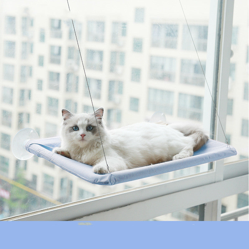Light blue wall mounted window cat hammock