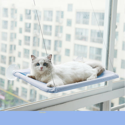 Light blue wall mounted window cat hammock