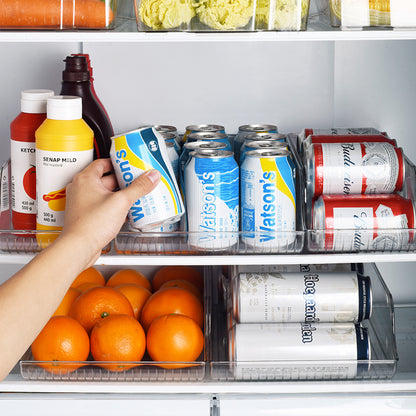 Transparent fridge can organizer dispenser filled with soda cans