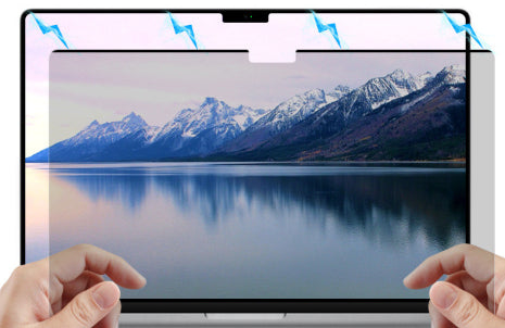 Person attaching magnetic privacy screen to laptop