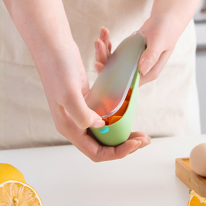 Opening the storage tube of the vegetable peeler to reveal orange peels