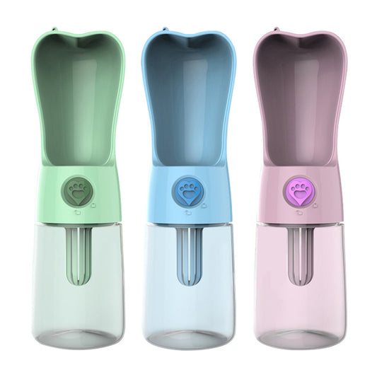 Portable pet water bottles in green, blue, and pink