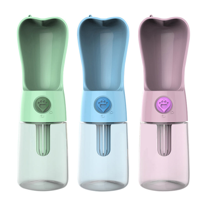 Portable pet water bottles in green, blue, and pink