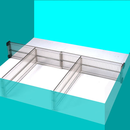 Three drawer dividers arranged to form compartments