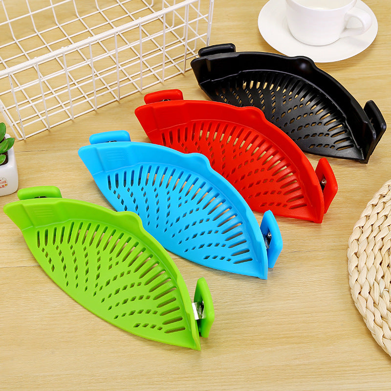 Clip-on silicone kitchen strainers in black, red, green, and blue
