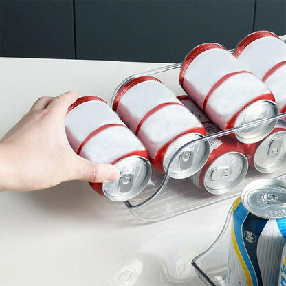Transparent fridge can organizer dispenser filled with cans
