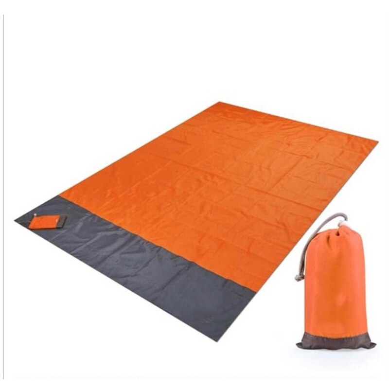 Orange waterproof picnic blanket and storage sack
