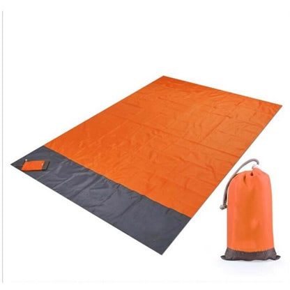 Orange waterproof picnic blanket and storage sack