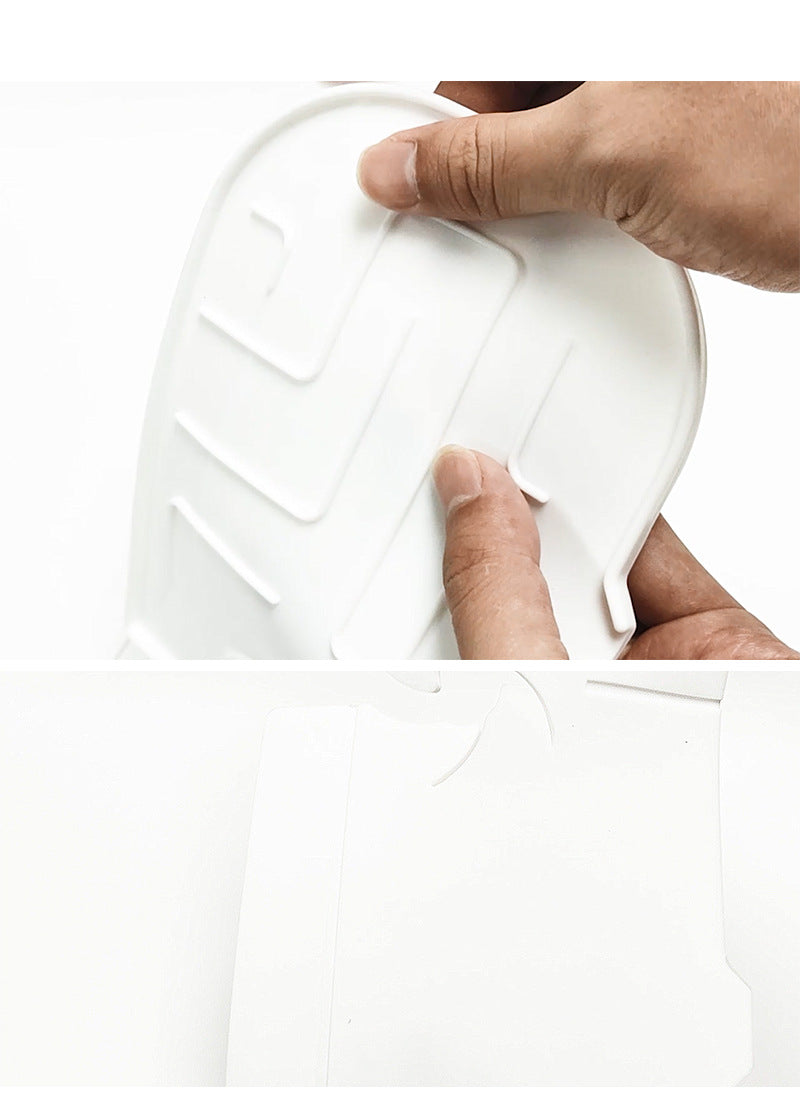 Close up of the flexible white silicone faucet splash guard mat