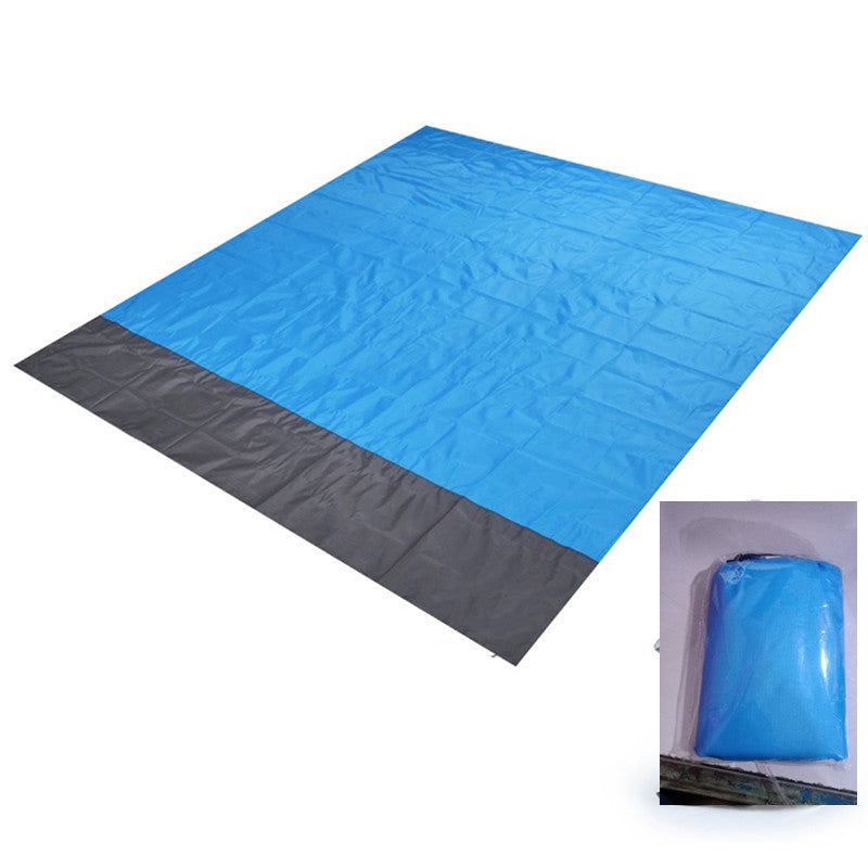 Blue waterproof picnic blanket and packaging