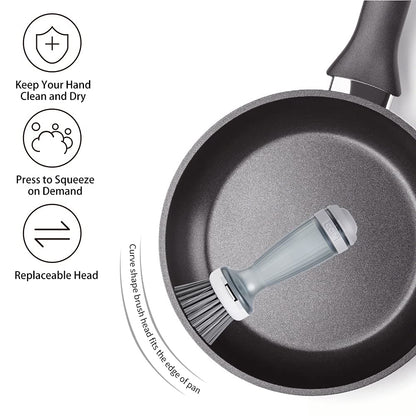 Soap dispensing dish brush shown inside a non-stick frying pan