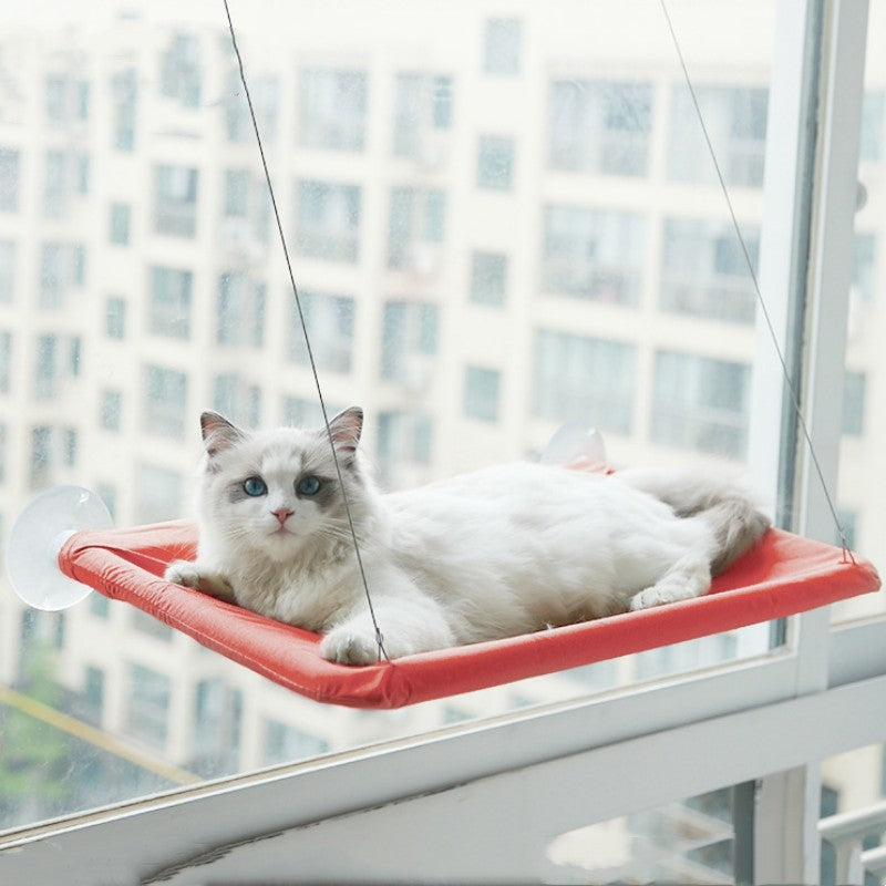 Orange wall mounted window cat hammock
