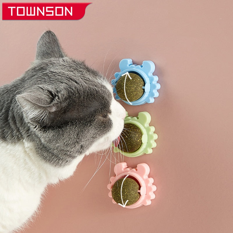 Green interactive rolling ball toy for active indoor cat play.