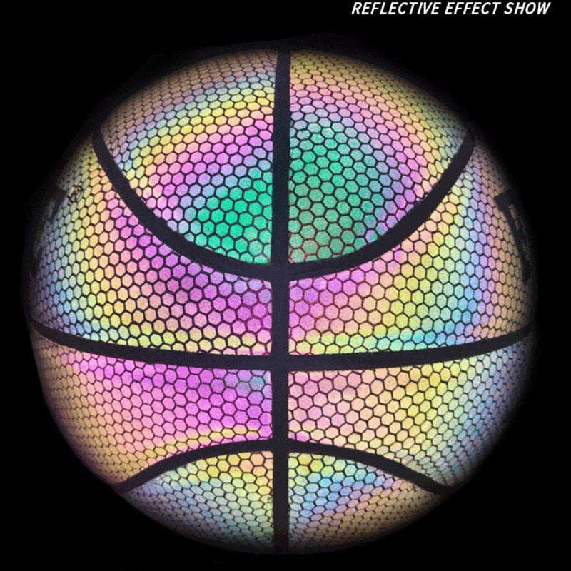 Holographic basketball glowing brightly while being spun on a finger