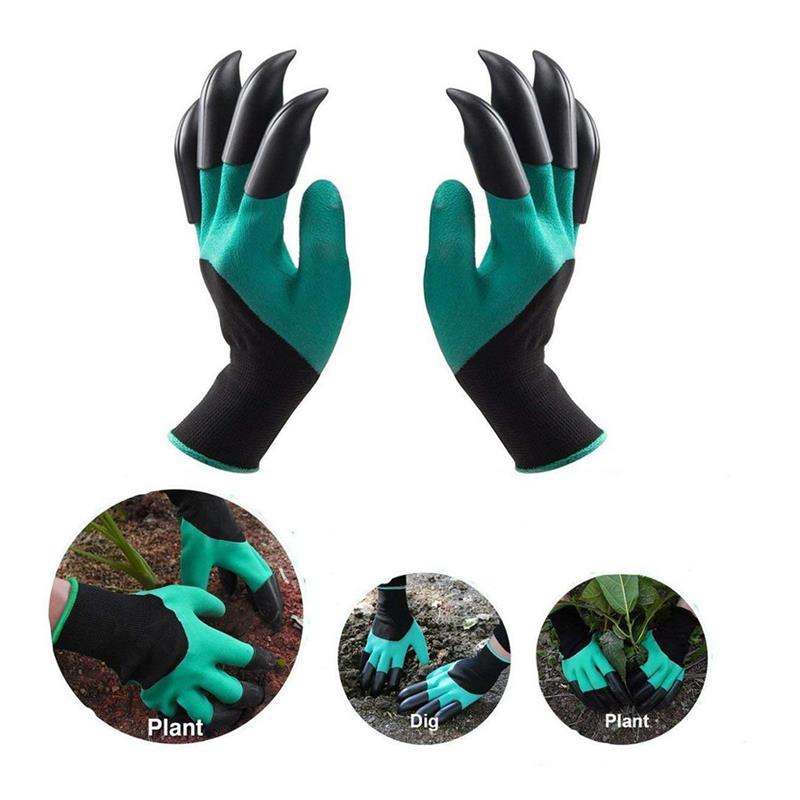 Hands wearing protective gardening gloves while digging in soil
