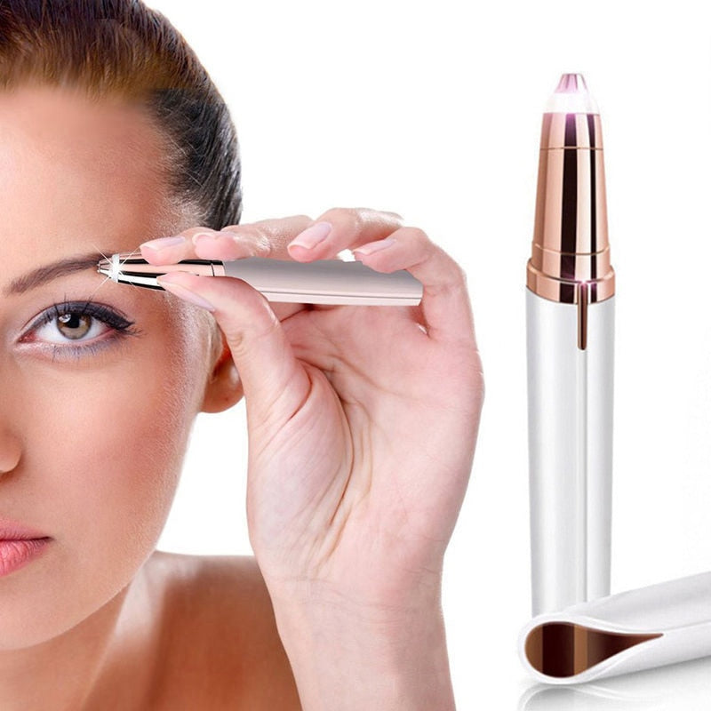 Close up of electric eyebrow trimmer precision tip against a clean background