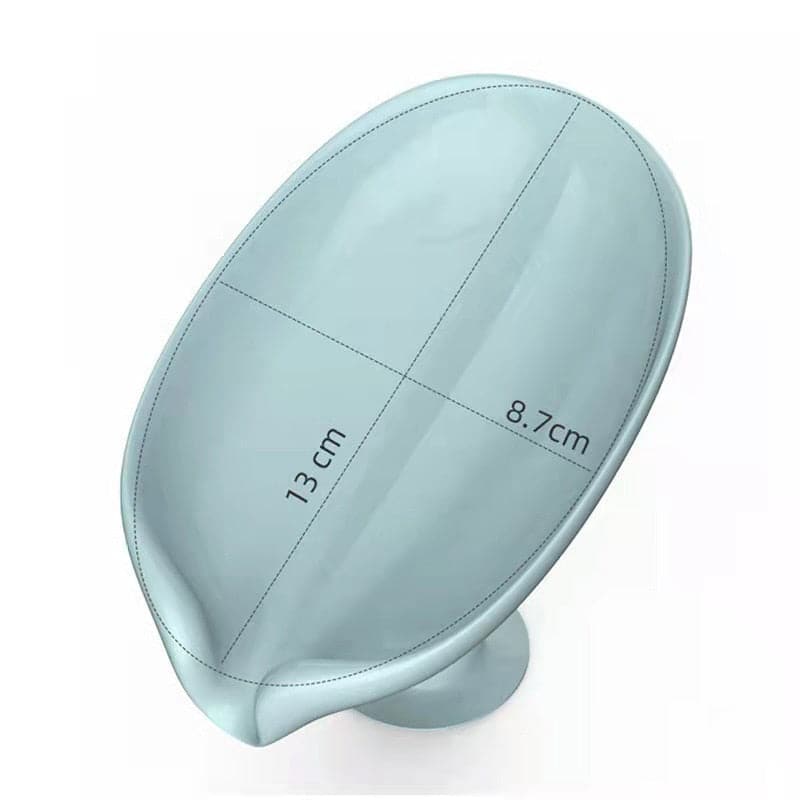 Two gray leaf soap dishes near a shower space