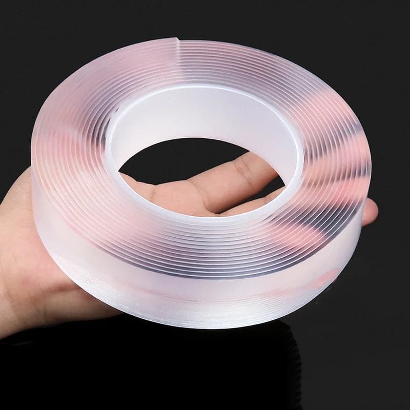 Clean removal of double-sided tape from a smooth wall