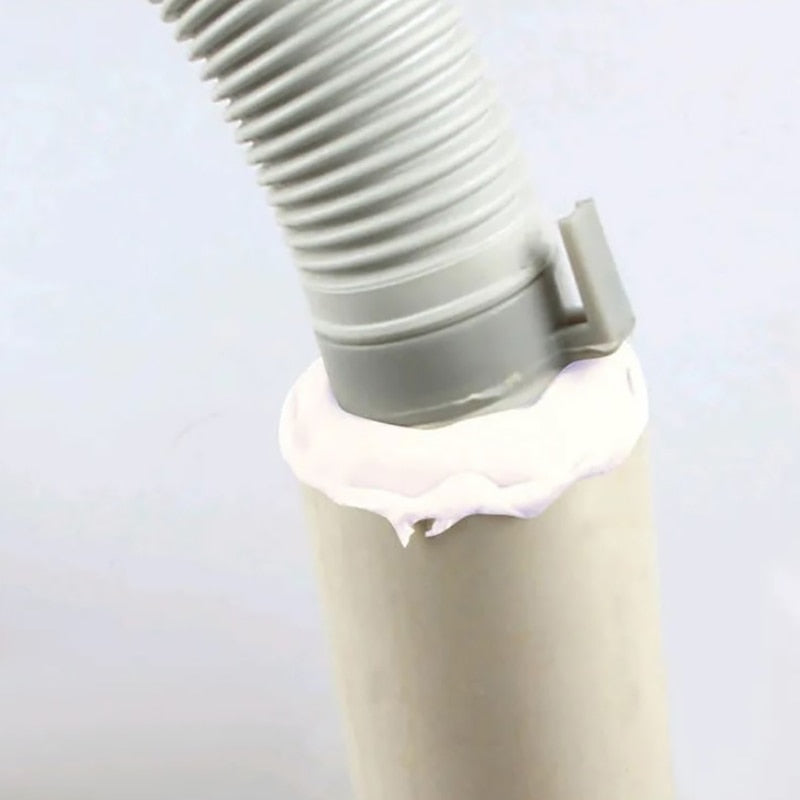 Applying moldable clay to block a gap around a wall pipe