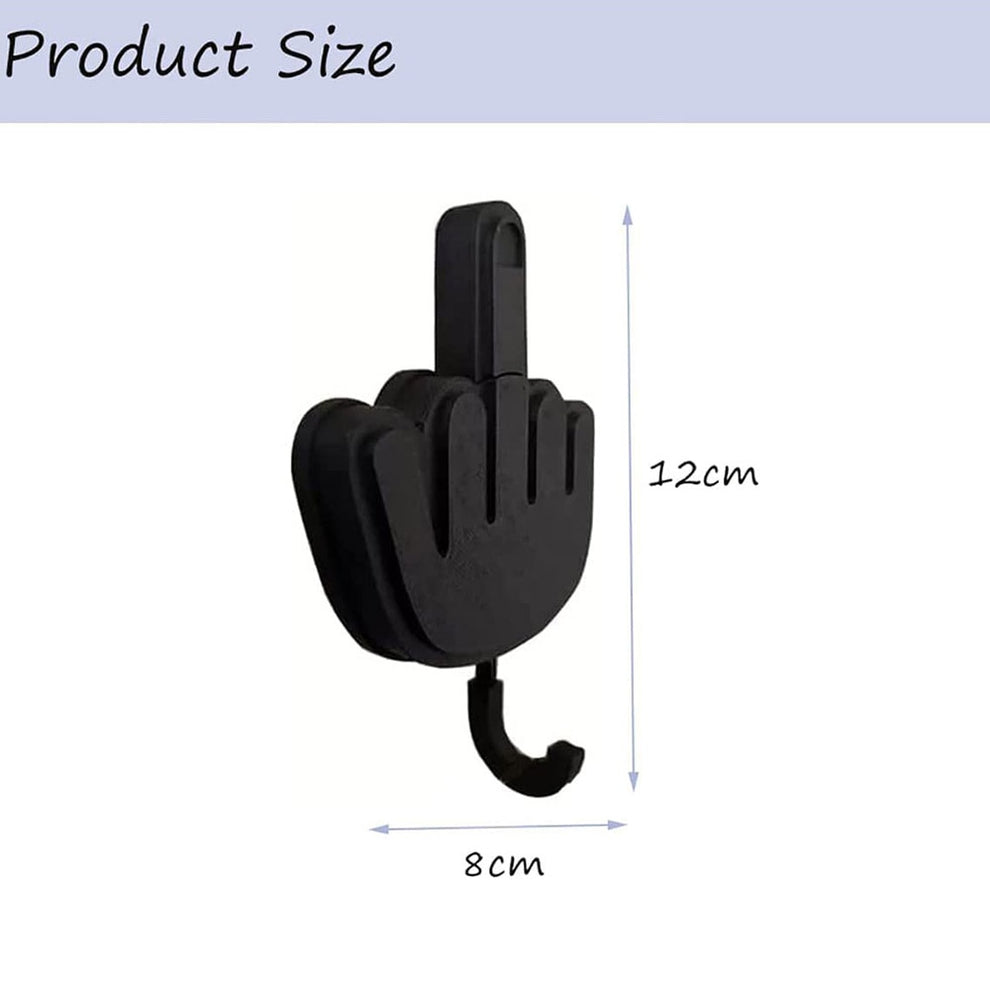 Humorous entryway key organizer on a bright wall.