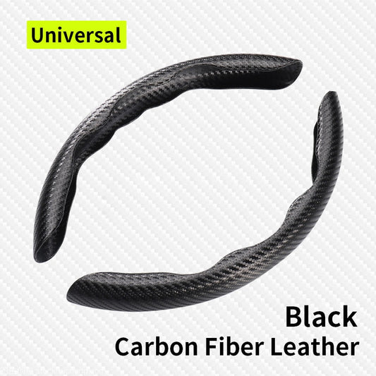 Blue carbon fiber style steering wheel cover pieces on a wheel
