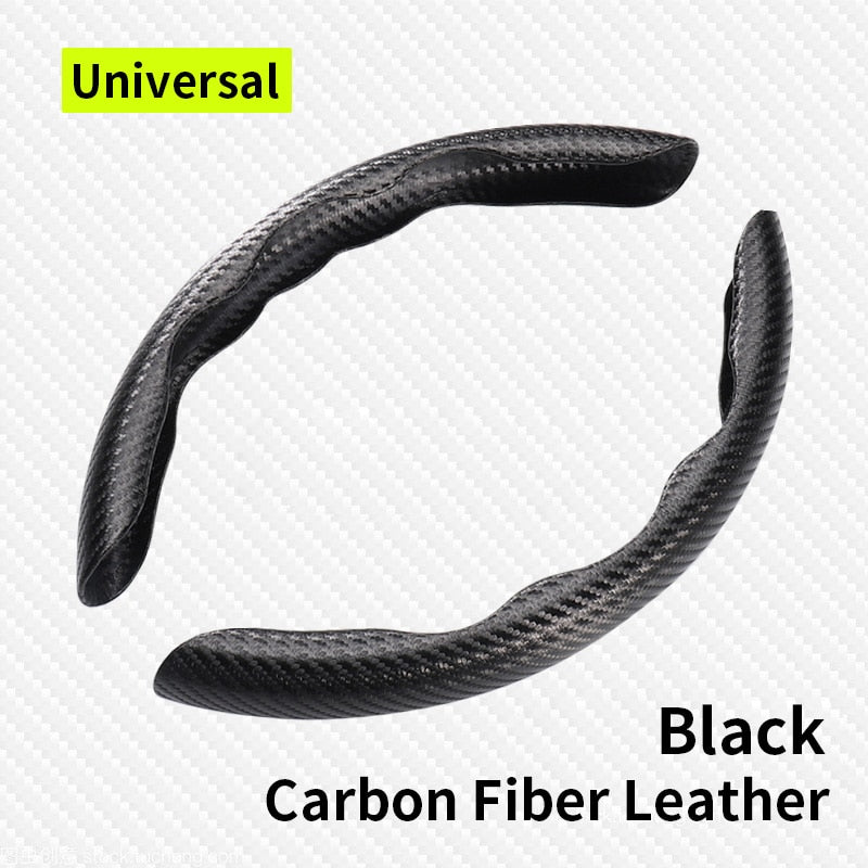 Blue carbon fiber style steering wheel cover pieces on a wheel
