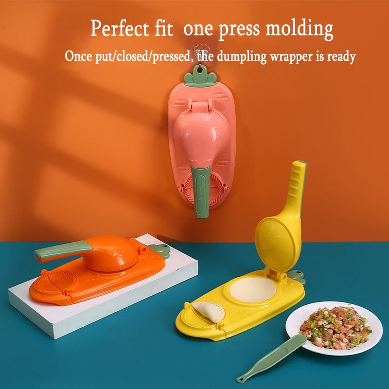 Pink 2-in-1 dumpling maker tool resting on a kitchen counter.