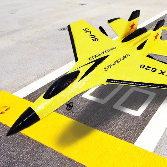 Red RC plane held by a beginner pilot