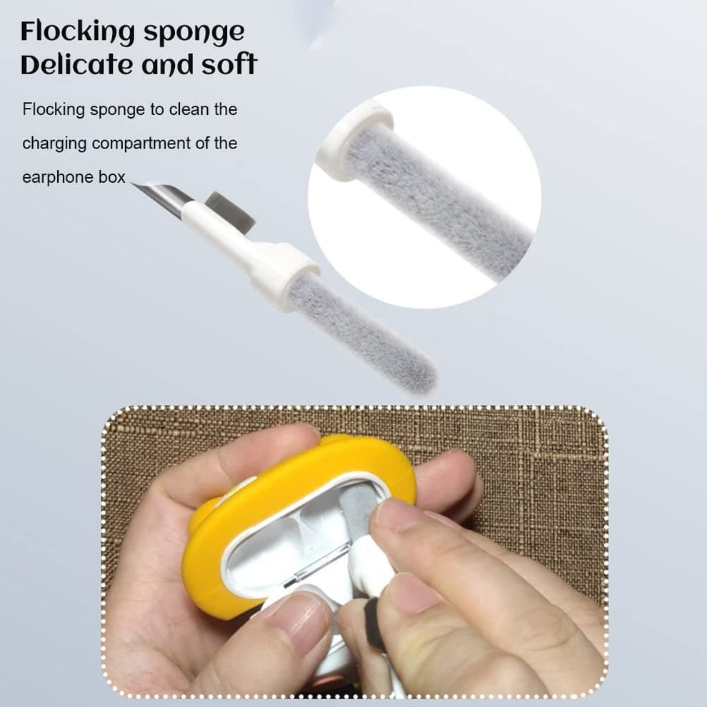 Compact white cleaning pen next to modern wireless earbuds